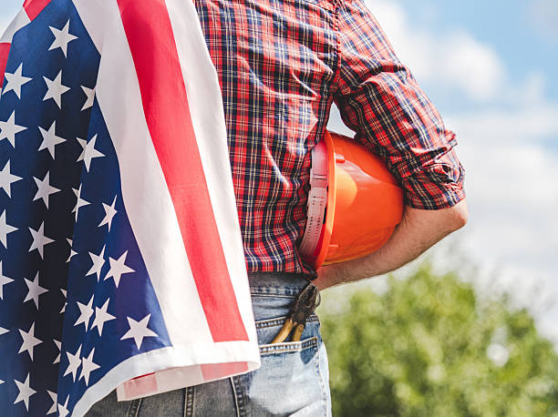 istock American flag and handsome man. Back view 2220658505