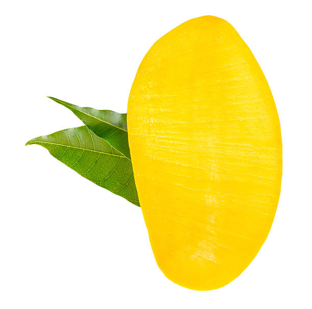 istock A half of ripe yellow mango fruit with green leaves isolated on white background with clipping path 2220658632