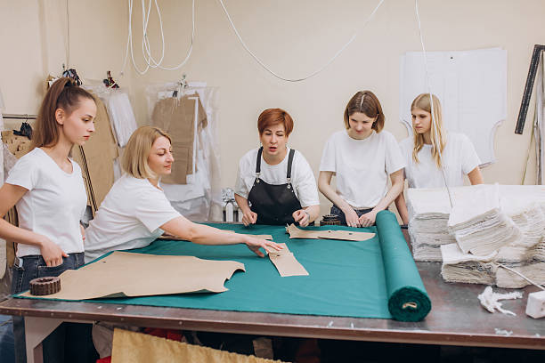 istock Seamstresses women at work in the sewing workshop, small business 2220659377
