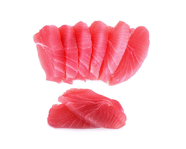istock tuna sashimi, raw tuna fish isolated on white background 2220660833