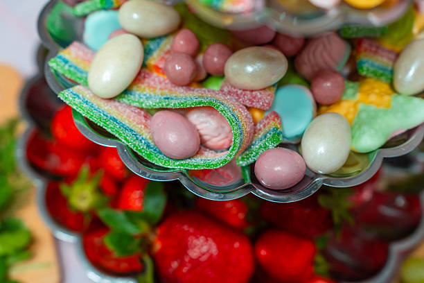 istock Candy bar multi-tiered table with marmalade and dragees 2220666619
