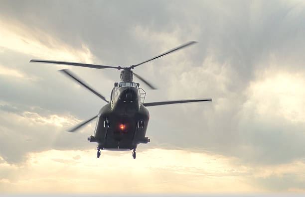 Cosford, UK - 12th June 2022: A Boeing Chinook military helicopter of the RAF hovers close to the ground