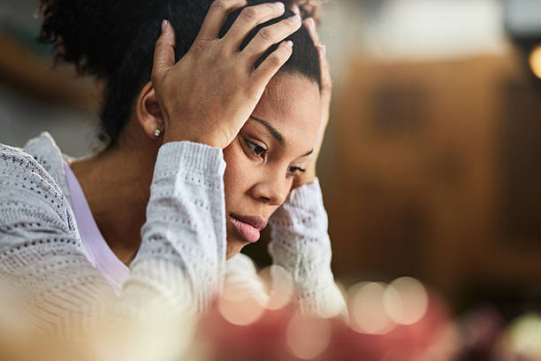 istock Young black woman feeling worried in the kitchen. 2220670997