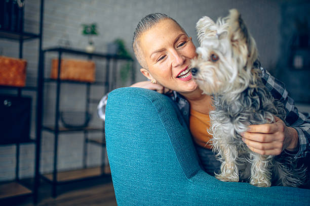 istock Middle-aged woman enjoying free time with her pet 2220673814
