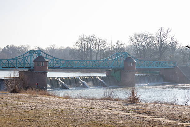 The Bartoszowice Weir (Jaz Bartoszowicki) on the Odra River, a significant hydraulic structure regulating water levels and flow, controlled cascade, essential for flood prevention
