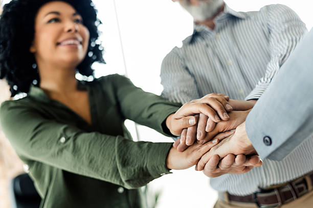 istock Group of diverse professionals in a collaborative meeting emphasizing teamwork, cooperation, and workplace unity with positive energy. 2220681457