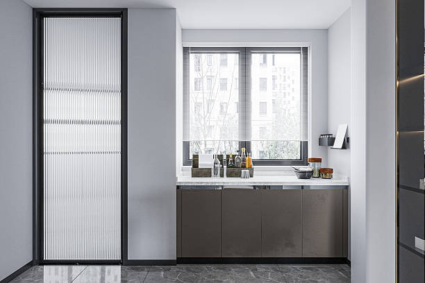 istock Modern Kitchen Counter-Sleek Cabinets and Window View with Stylish Decor 2220682225