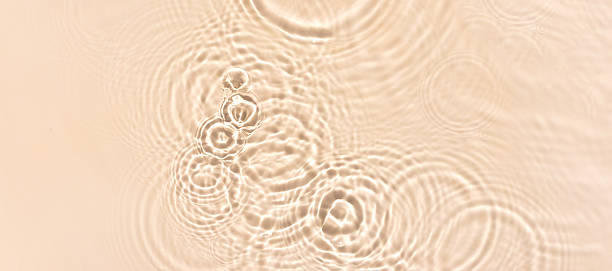 istock water texture ripples wave clean transparent water abstract background in beige color 2220682397