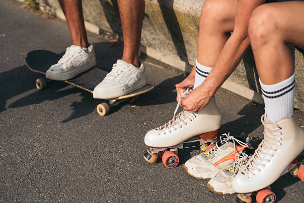 Urban scene depicting young people enjoying roller skating and skateboarding in barcelona, showcasing a vibrant youth lifestyle