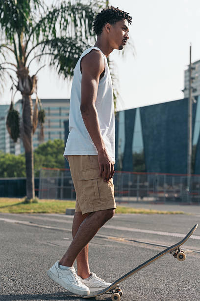 istock Young man balancing on skateboard in barcelona 2220683880