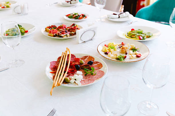 istock Gourmet dining experience showcasing an array of exquisite appetizers and salads 2220684180