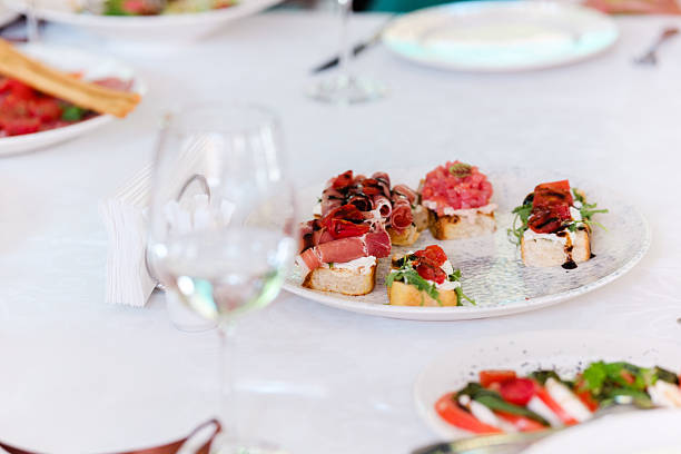 istock Gourmet appetizers served on a silver platter at a celebratory gathering 2220684195