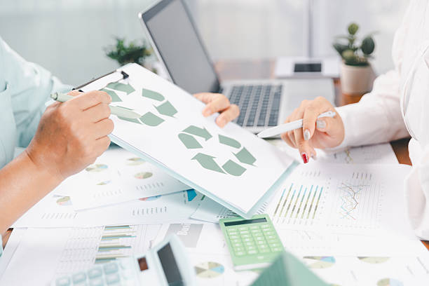 istock Business people working on sustainable innovation project. renewable energy concept. Teamwork Meeting, partner on model building company office technology, based green businesses and global warming. 2220688821