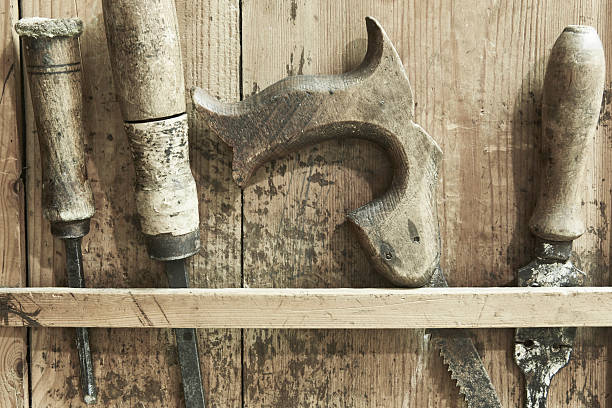 istock Old handmade carpenter tools. Antique workshop. Vintage traditional instrument 2220690292