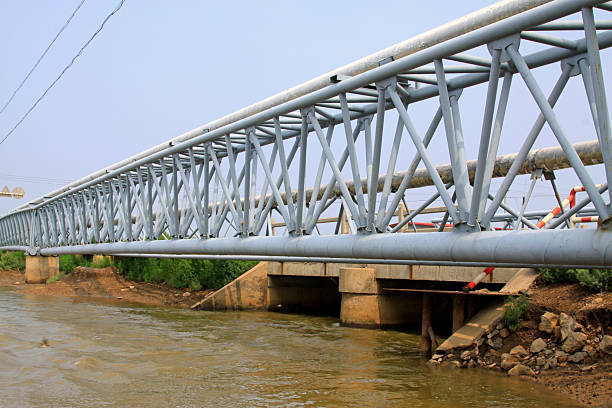 Oil pipelines and bridges, closeup of photo