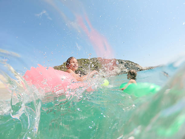 istock Beautiful children enjoying summer vacation 2220699596