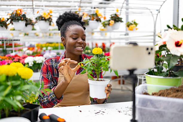 istock Woman Vlogging About Marigold Plants 2220700804
