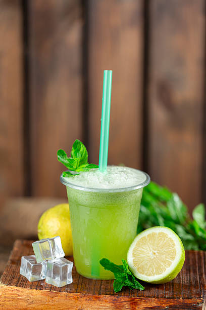 istock Refreshing and iced lemon mint juice. 2220703028