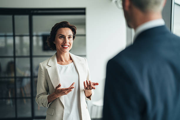 istock Confident businesswoman engaging in professional discussion 2220703088