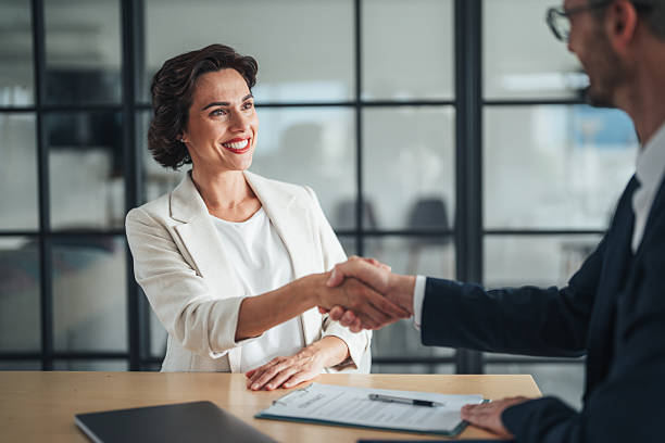 istock Successful business agreement sealed with a handshake in modern office 2220703107