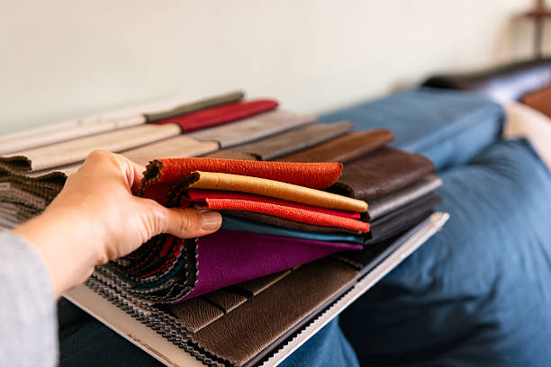 Close-up of different types of fabric for upholstery on the sofa