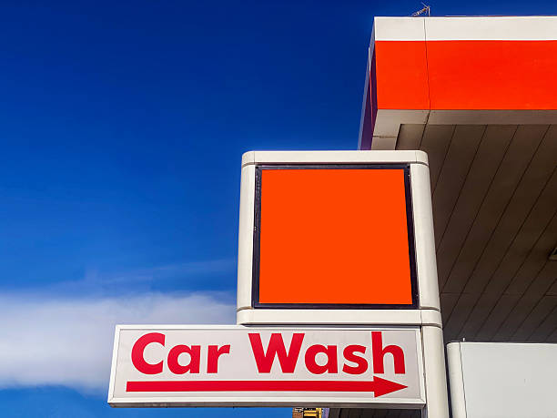 istock Sign advertising a car wash place 2220705213