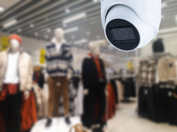 istock Surveillance camera shopping department store on the background 2220714659