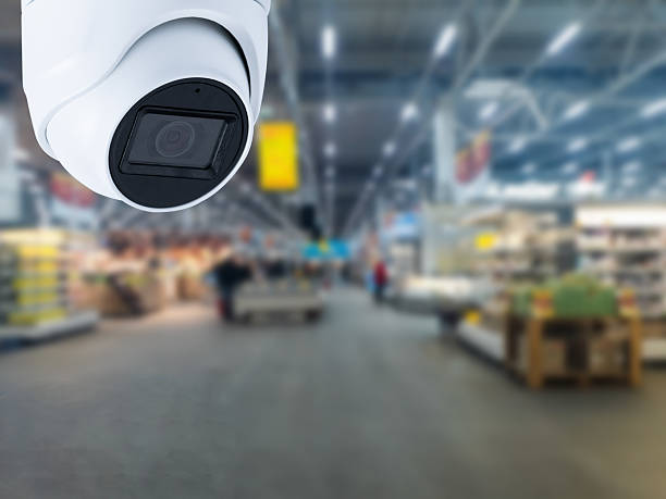 istock Surveillance camera shopping department store on the background 2220714663
