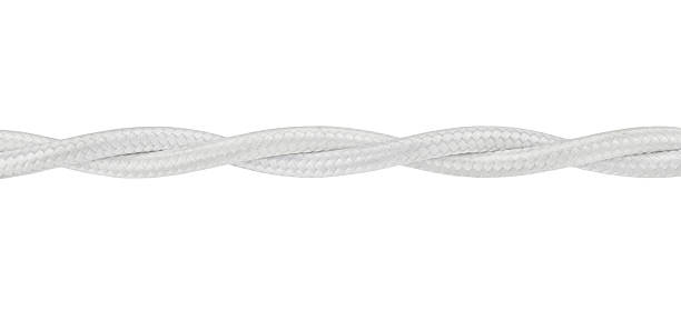 istock Close-up white twisted retro electric wire cable isolated on a white background. Full depth of field. 2220715877