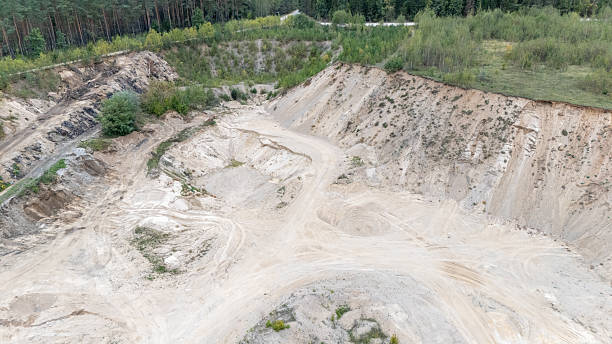 istock Aerial View of Sand Quarry and Surrounding Greenery 2220715962