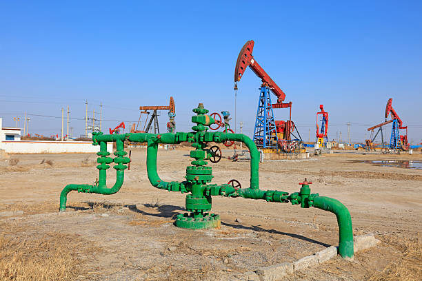 istock Oil pipeline and pumping unit 2220718597