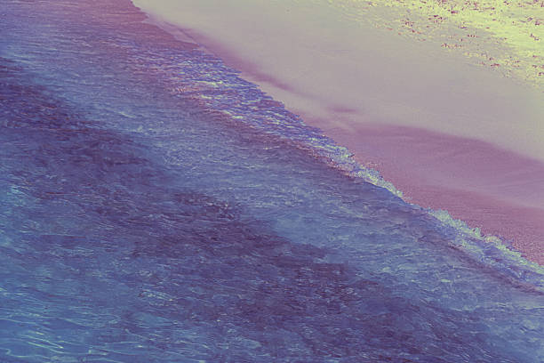 istock Sand beach and ocean water 2220718988