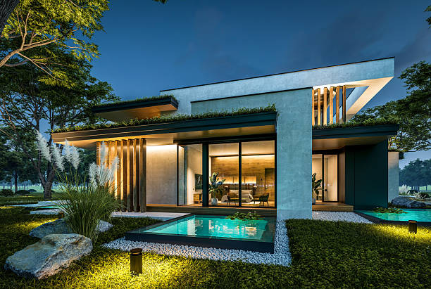 istock 3d rendering of two-story house with concrete facade in night 2220720220
