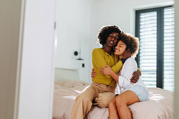 istock Black Mom and Multiracial Daughter Sharing a Warm Embrace 2220724662