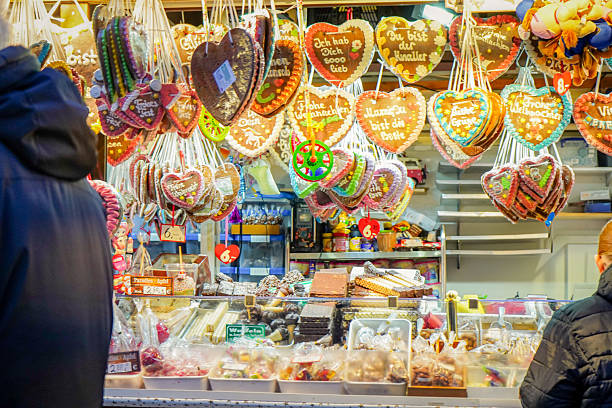 Christmas market decorated heart shaped gingerbread kiosk, Essen Germany
