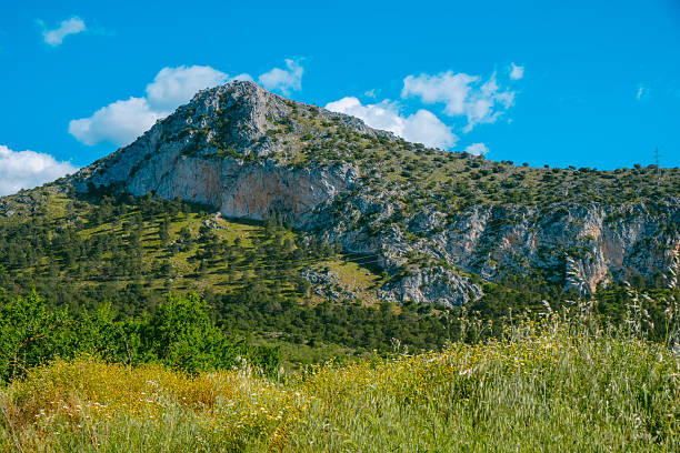 a view of the Sierra del Camorro mountain, part of the Subbaetic range within the Baetic Systems, in Cuevas de San Marcos, Malaga province, southern Spain, on a sunny spring day