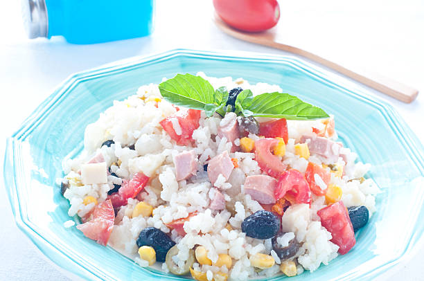 istock Rice salad with tomatoes, sausage and onions 2220727691