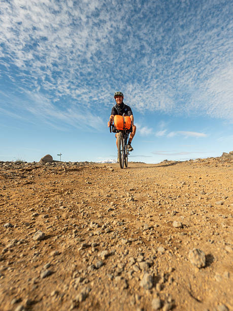 istock Cyclist Riding on Rocky Desert Trail 2220740431