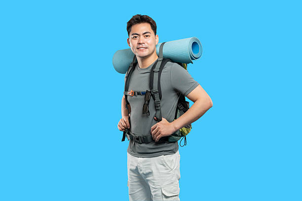 istock Enthusiastic backpacker ready for adventure outdoors travel and exploration Smiling and equipped 2220743085
