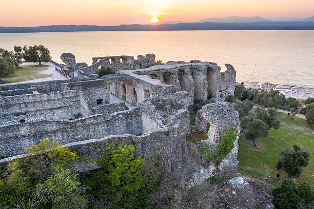 istock Ancient Roman ruins by Lake Garda at sunset 2220744880