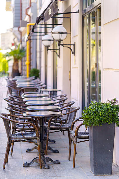 istock Round tables and chairs in an outdoor cafe. 2220748671