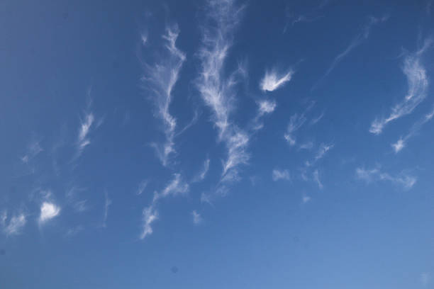 istock High altitude cirrus clouds scattered across a clear blue sky. This light and airy cloud formation is ideal for backgrounds, weather themed visuals and nature focused digital designs. 2220755541