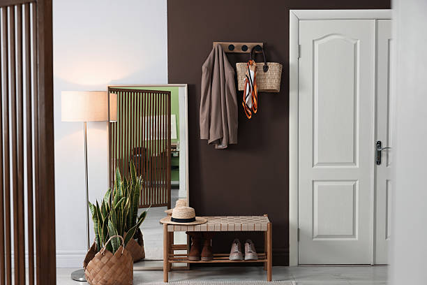 istock Stylish hallway interior with coat rack and mirror 2220759600
