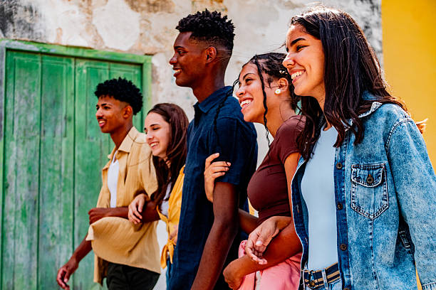 istock Young friends walking outdoors 2220761272