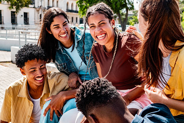 istock Young friends talking outdoors 2220761527