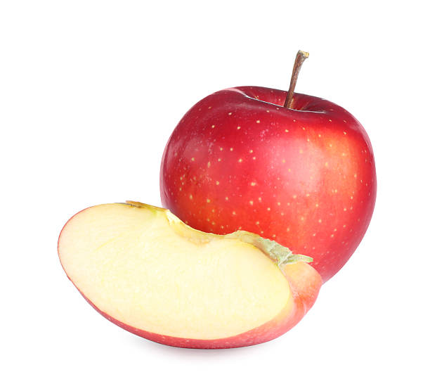 istock Whole and cut fresh apples isolated on white 2220763118