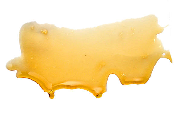 istock Sweet honey isolated on white background 2220763313