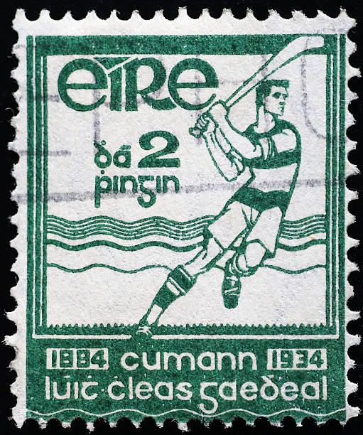 istock Field hockey player on ancient irish postage stamp 2220764173