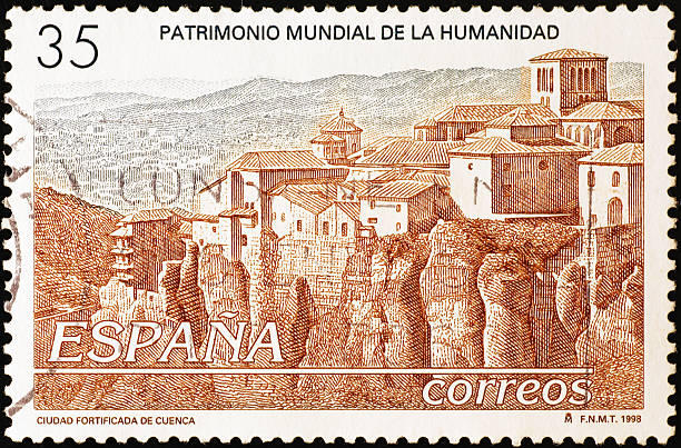 istock Fortified city of Cuenca on spanish postage stamp 2220764310