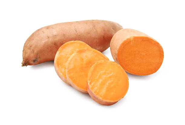 istock Fresh raw sweet potatoes isolated on white 2220765468
